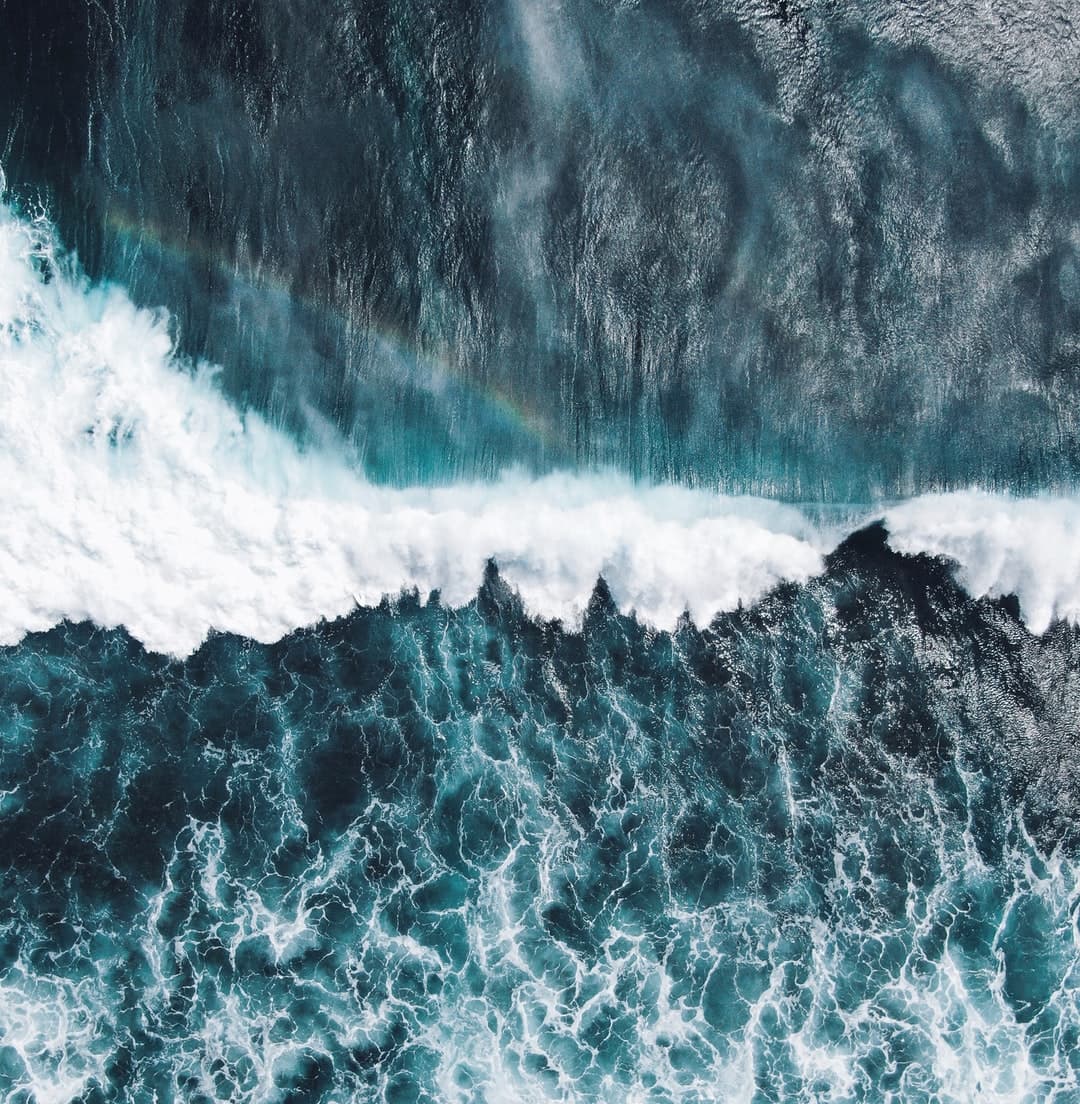 Light reflecting across the surface of the ocean